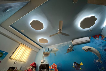 false ceiling design by Reflections Interior Studio